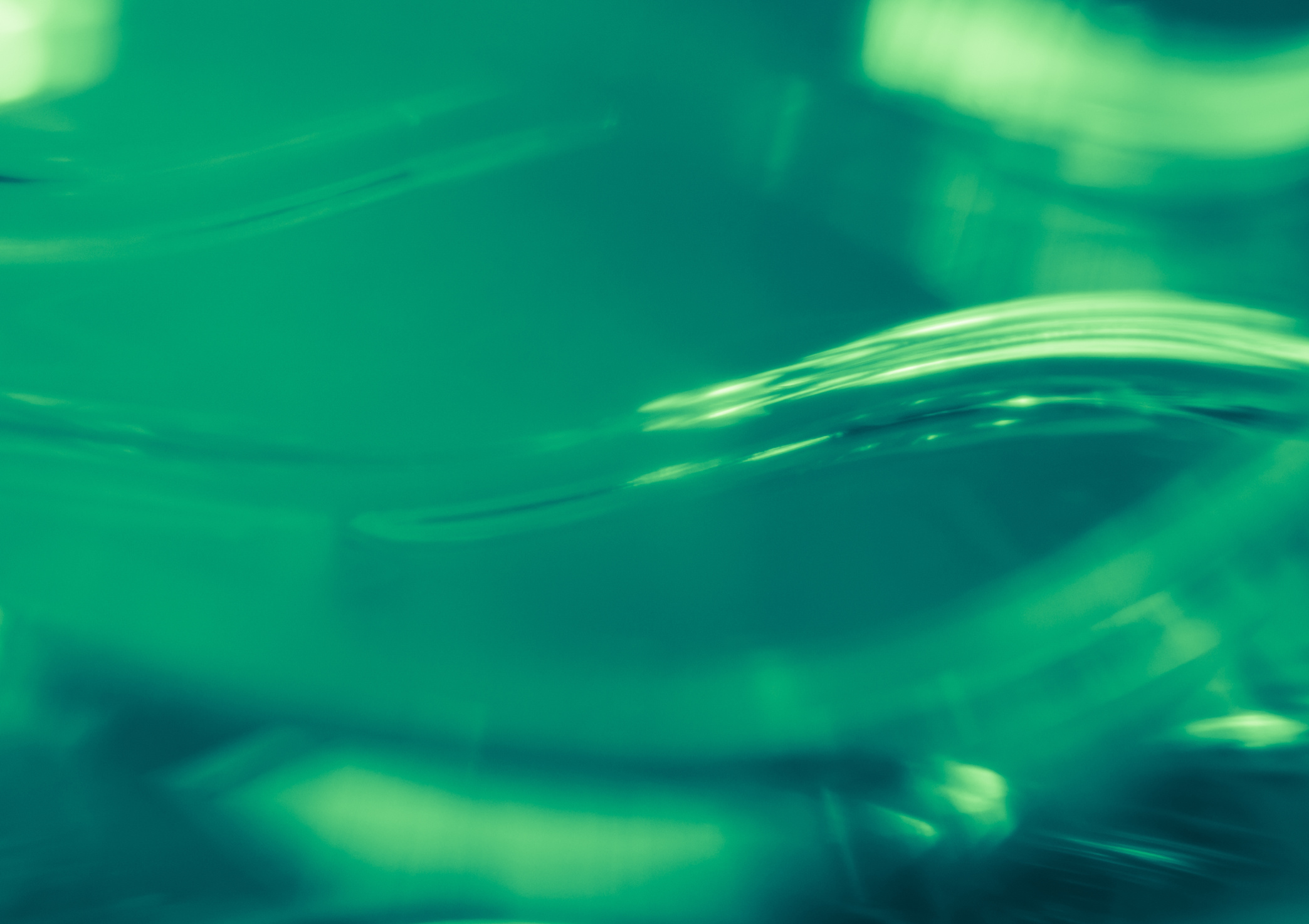 Emerald Green Blurred Curve Abstract Background